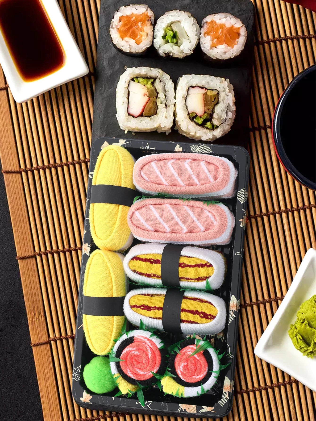 4pair of mid-calf unisex socks in a salmon sushi design, a novel and creative practical gift that is fun for the holidays.