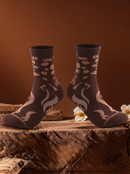 1 pair of mid-calf socks for men and women, featuring a novelty coffee can design, practical and suitable for holiday gifting.
